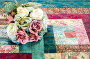 Silk Flowers on a Vintage Quilt